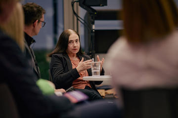 Panellists deep in discussion during an event
