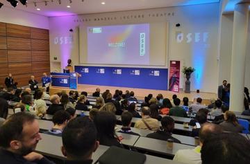 The OSEF welcome talk in a busy lecture theatre